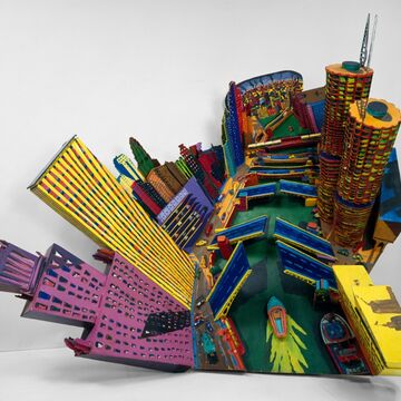 A sculpture of Chicago made with plywood and beaverboard, acrylic paint, and motors.