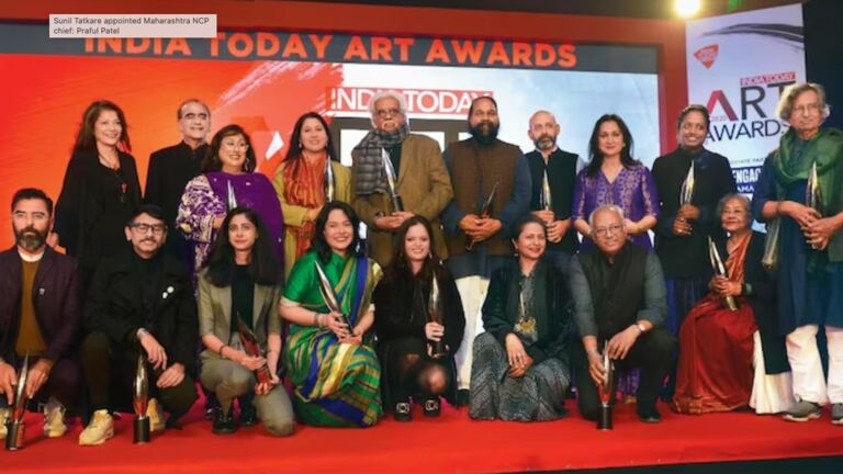 A group of awardees pose for a photo