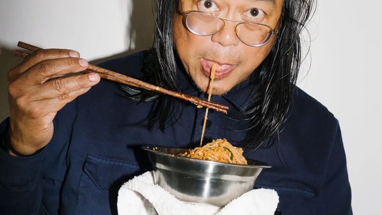 Artist Rirkrit Tiravanija eats pad thai