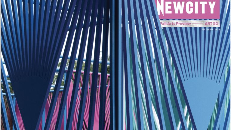 A sculpture made out of metal, blue diagonal descending lines