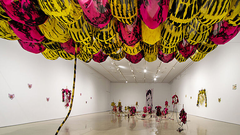 Multimedia fiber installations by Jade Yumang  in a gallery space. 