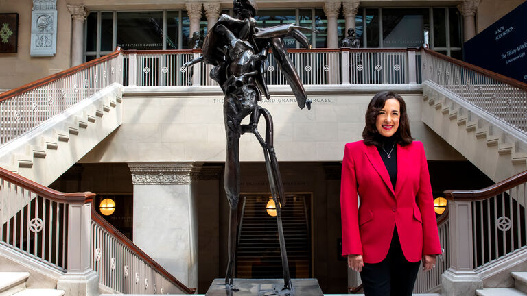 Denise Gardner stands in the atrium of the Art Institute of Chicago