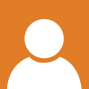 A silhouette of a person against an orange background.