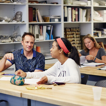 Students talking an working in an HPRES classroom