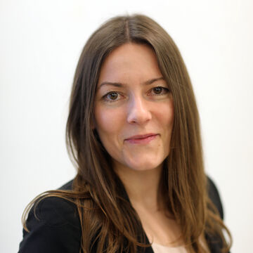 A headshot of Cathy Carlson, Vice President of Financial Analysis and Planning.