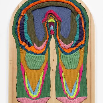 Colorful macramé mounted on carved plywood.