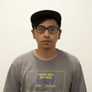 A headshot of SAIC photography student Hugo Amarales