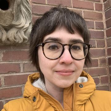 Selfie of a white adult person outdoors