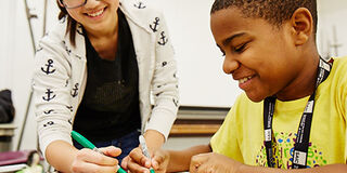 Middle school students work on art project