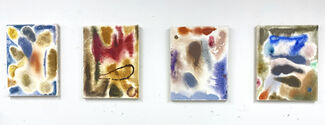 Four abstract paintings by Diana Motta hanging in a gallery space