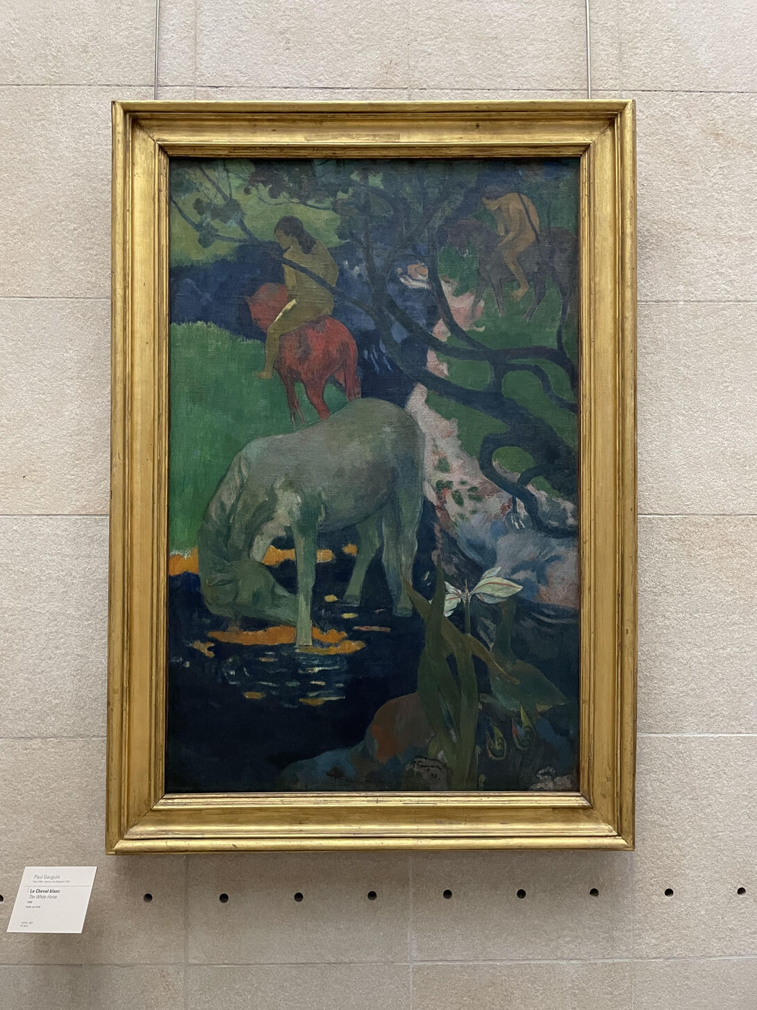 photo of a gilded Frame Gauguin painting featuring an impressionist white horse.