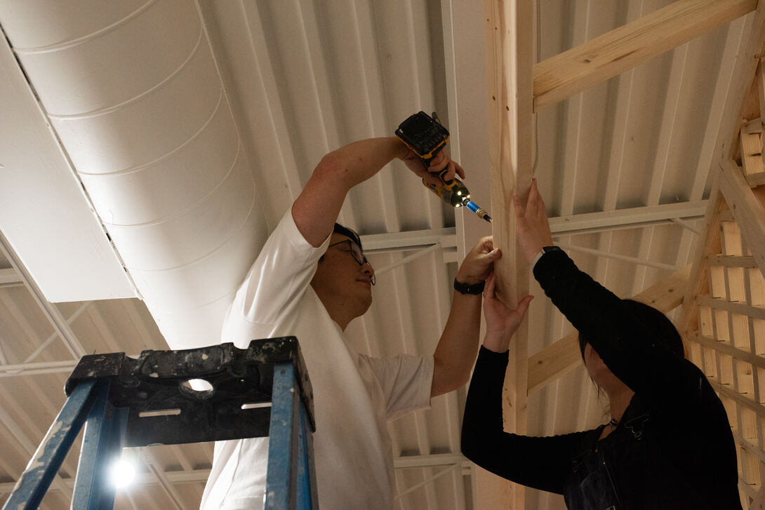 IIT and SAIC students work to install the 1893 pavillion